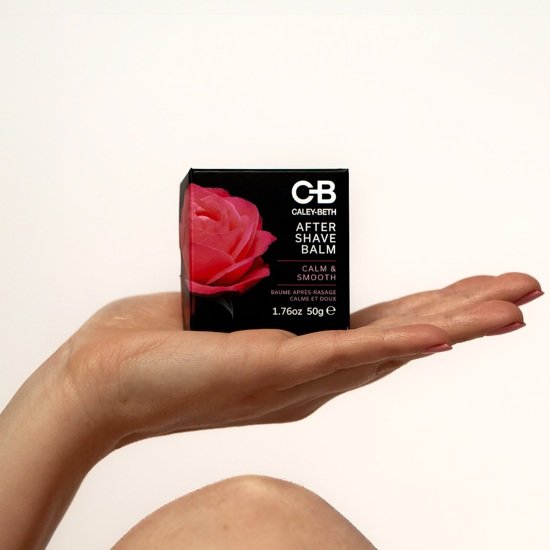 A woman holding Caley-Beth After Shave Balm Bar, perfect for sensitive skin to soothe irritation and lock in moisture. Made in Canada.
