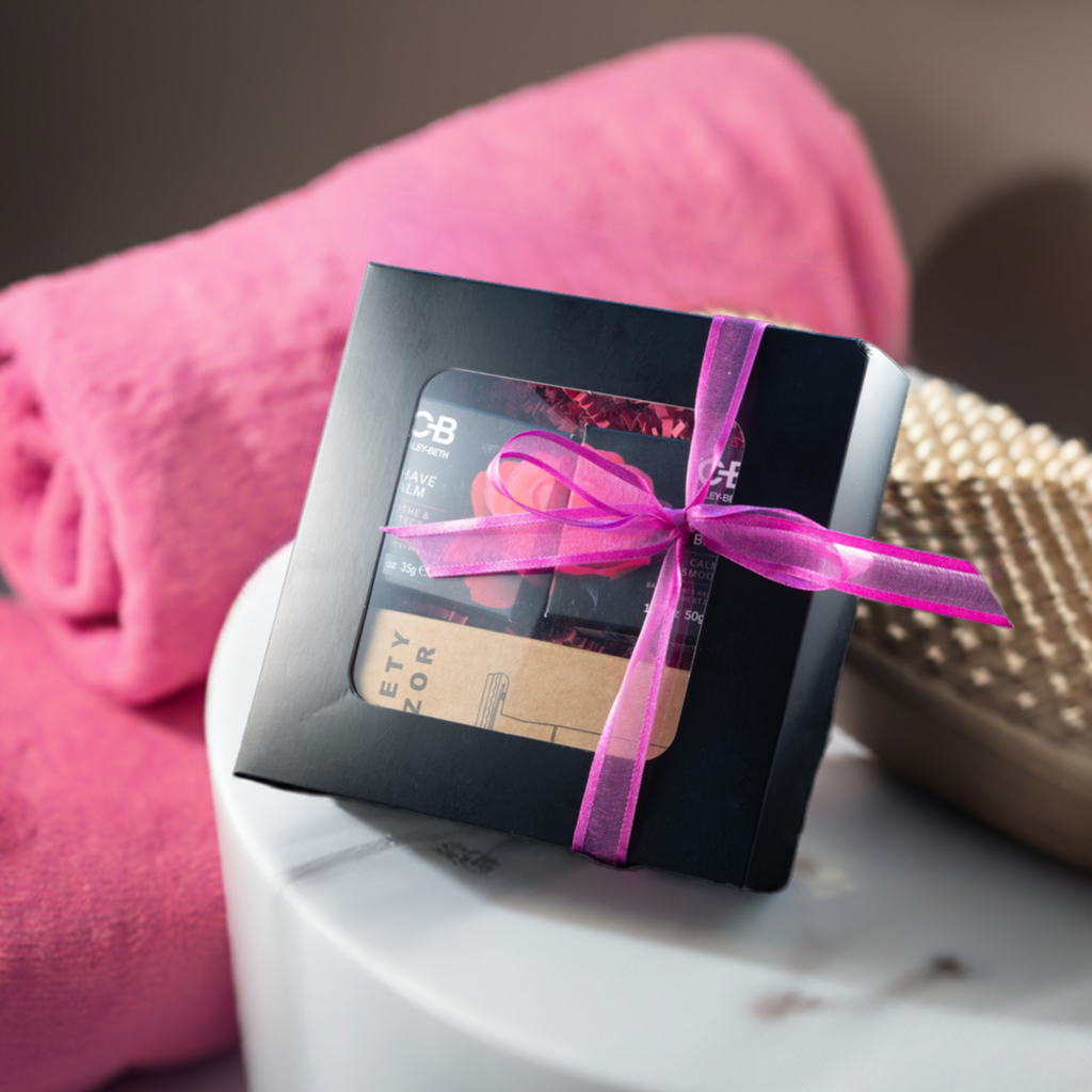 A beautifully gift-wrapped Ultimate Smooth Shave Set in a premium beauty box, featuring eco-friendly shaving essentials for a smooth, irritation-free shave.