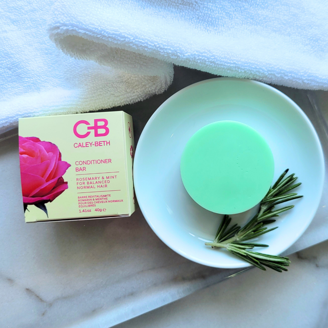 Caley-Beth Solid Conditioner Bar in Rosemary & Mint shown beside its eco-friendly box, highlighting its clean, Canadian-made, zero-waste design