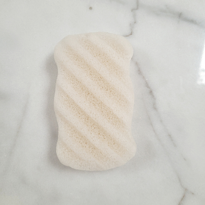 Caley-Beth sustainable skin and body care Toronto, Ontario Canada.   Eco-friendly Konjac Body & Face Sponge in four colours; Black bamboo charcoal, White natural, Light pink cherry blossom, and Pink/Red French Red clay.
