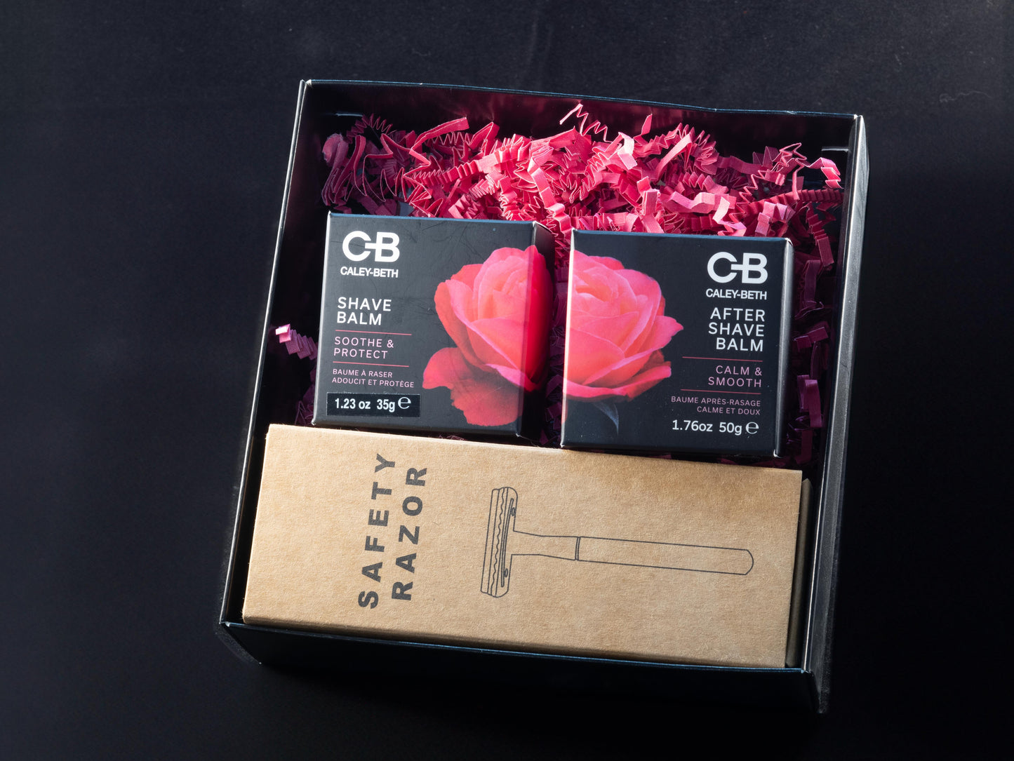 The Ultimate Smooth Shave Set displayed with a safety razor, shave balm, after shave balm, and refill blades—everything needed for a gentle, luxurious shave.