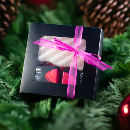 Holiday gift-ready Ingrown Hair & Razor Bump Shave Set wrapped in a box with a bow, including Shave Balm, After Shave Balm, and Konjac Sponge for smooth, irritation-free skin.