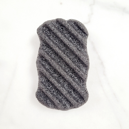 A flat lay of each Konjac Sponge in Bamboo Charcoal, showcasing variety in natural, eco-friendly exfoliating sponges