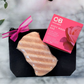The Perfectly Polished Bathing Set featuring a soap-free Body Wash Bar, Konjac Exfoliating Sponge, and Black Canvas Travel Bag. Made in Canada with natural ingredients.