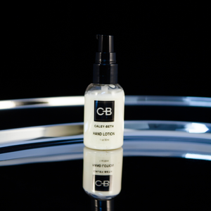 Open image in slideshow, Mini Travel/ trial size Caley-Beth Hand and Body Lotion with a treatment pump.
